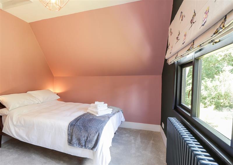 One of the 3 bedrooms at Baldwins Hill Cottage, Loughton