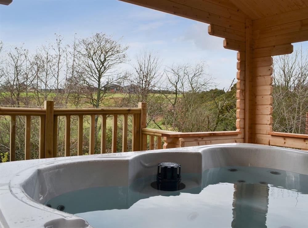 Relax in the fantastic hot tub iverlooking the surrounding countryside at Ballinorig Lodge in Cleator Moor, near Whitehaven, Cumbria