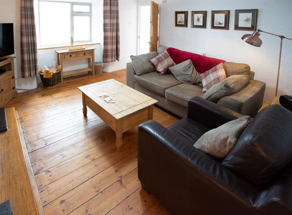 Characterful living room at Balloan Farm Cottage in Lairg, Highlands, Sutherland