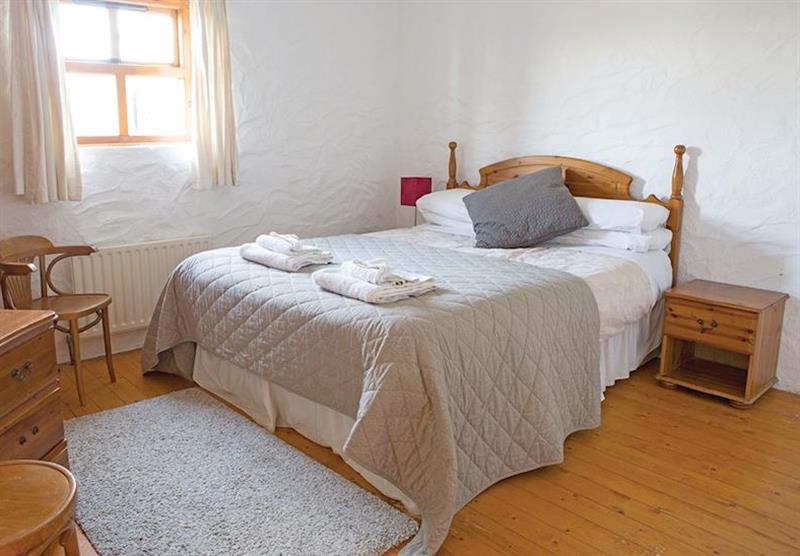 One of the bedrooms in a Portnaboe Cottage at Ballylinney Holiday Cottages in Bushmills, Northern Ireland