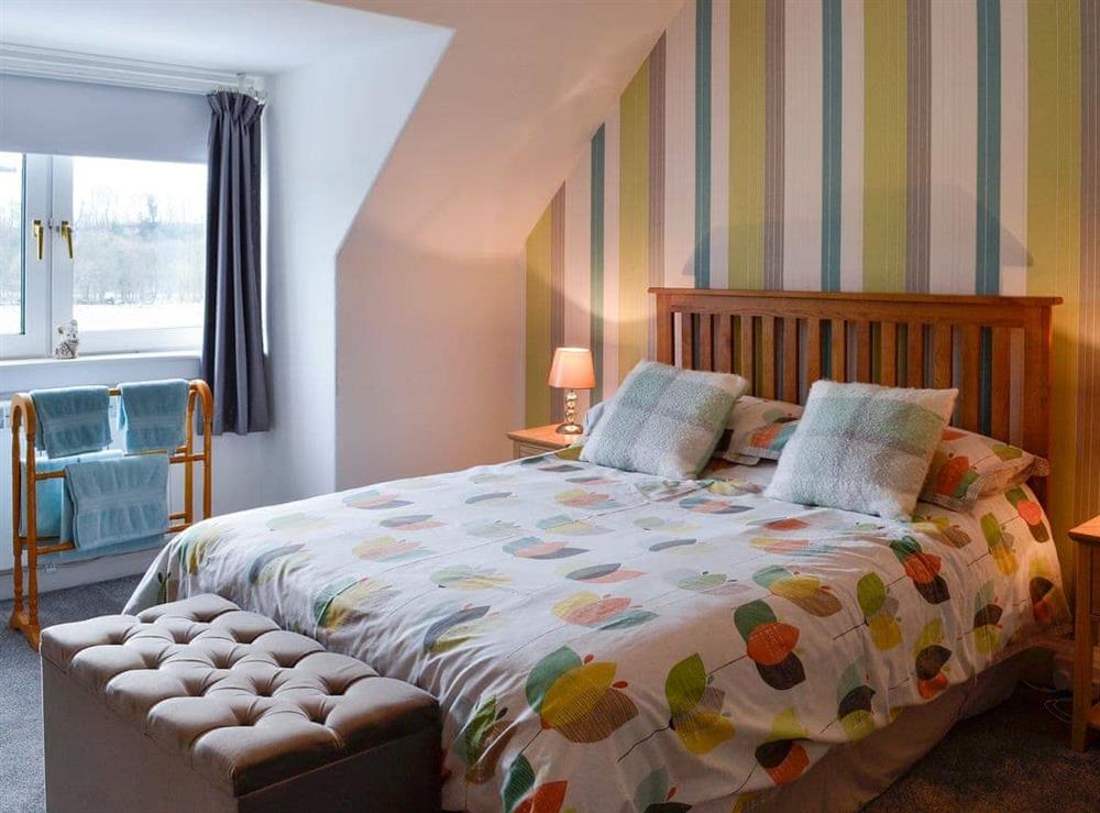 Welcoming double bedroom at Balnowlart Lodge in Ballantrae, Ayrshire