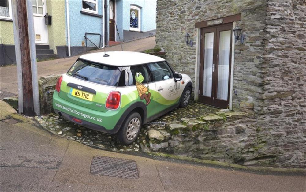 Banjo Cottage's small parking space outside the middle level. at Banjo Cottage in Looe