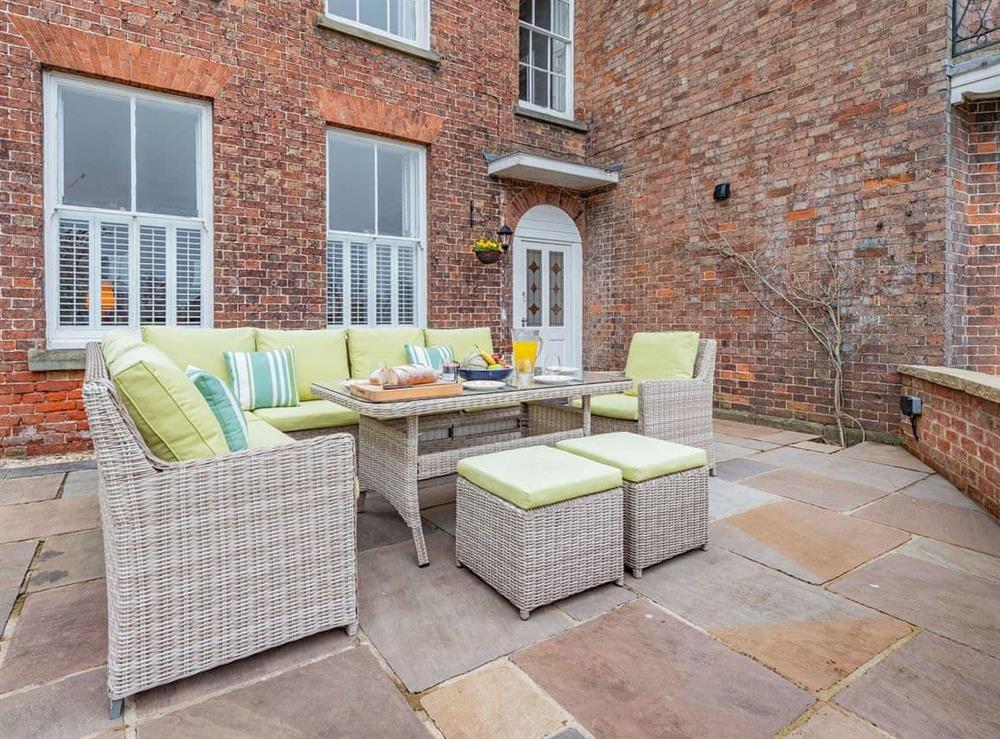 Outdoor eating area at Bank Apartment in Newnham, near Lydney, Wigtownshire