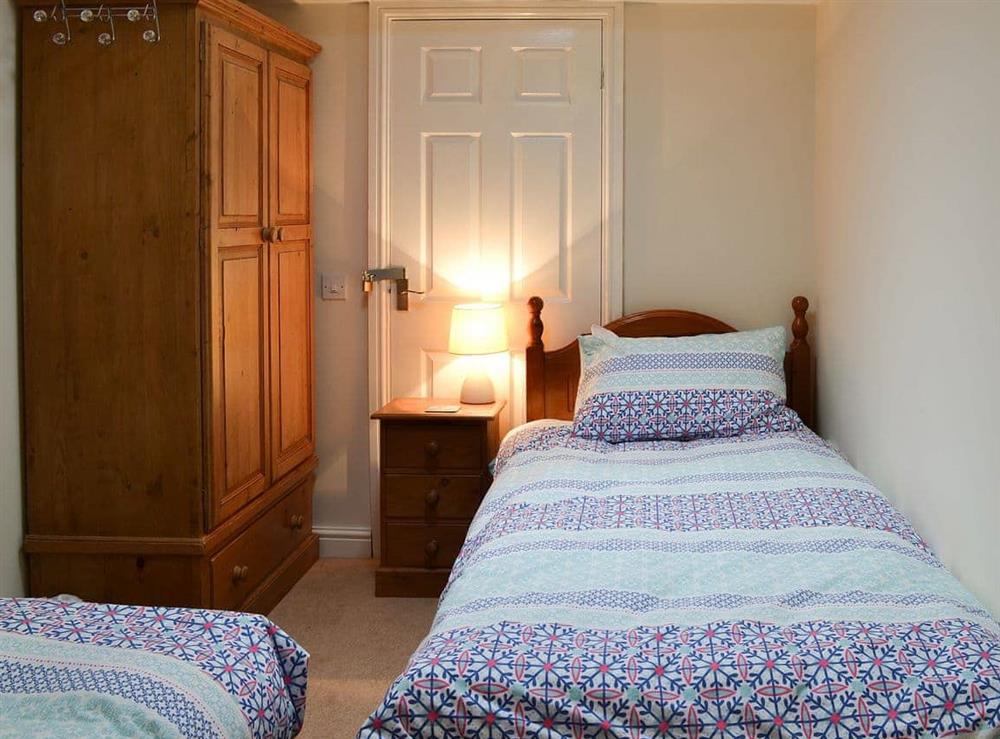 Charming twin bedded room at River View Cottage, 