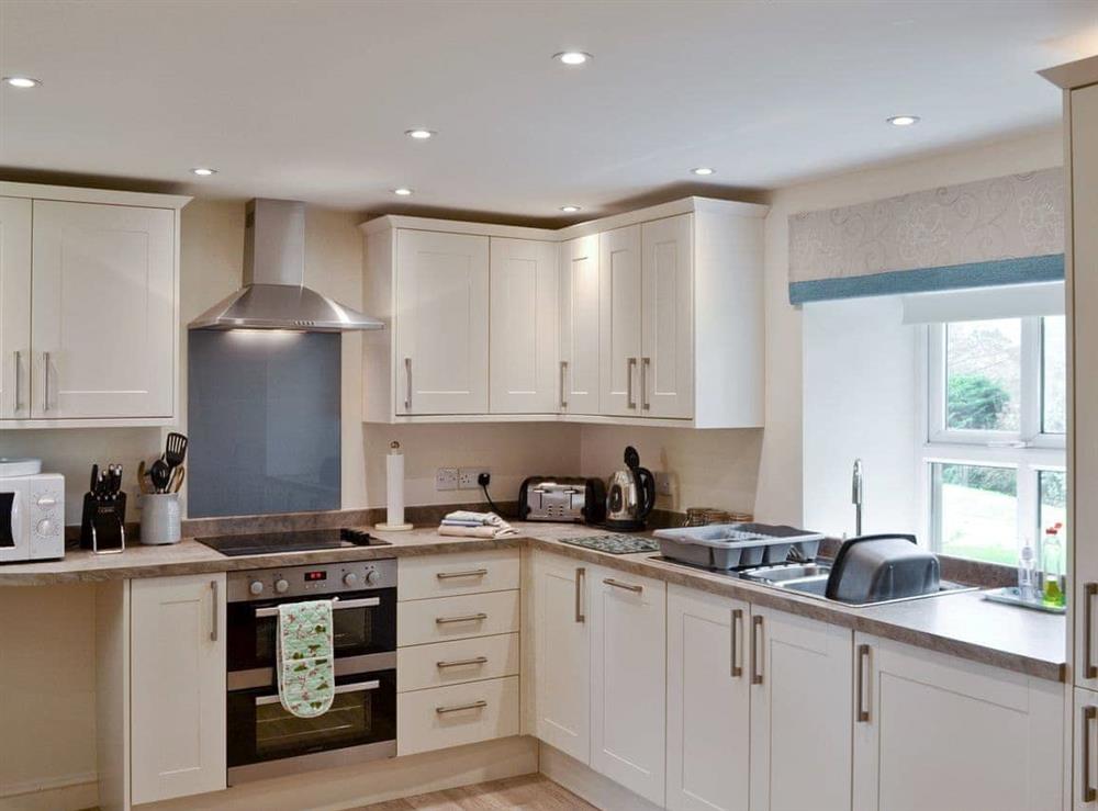 Well-equipped fully fitted kitchen at River View Cottage, 