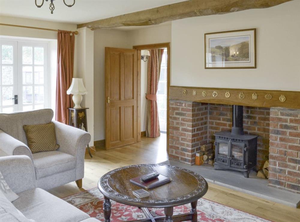 Characterful fireplace with wood burner at Bank Top Cottage in Pickering, North Yorkshire