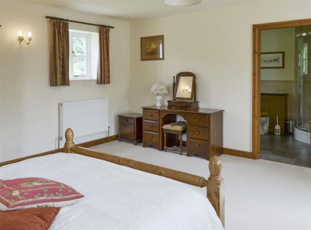 Comfortable double bedroom with en-suite bathroom at Bank Top Cottage in Pickering, North Yorkshire