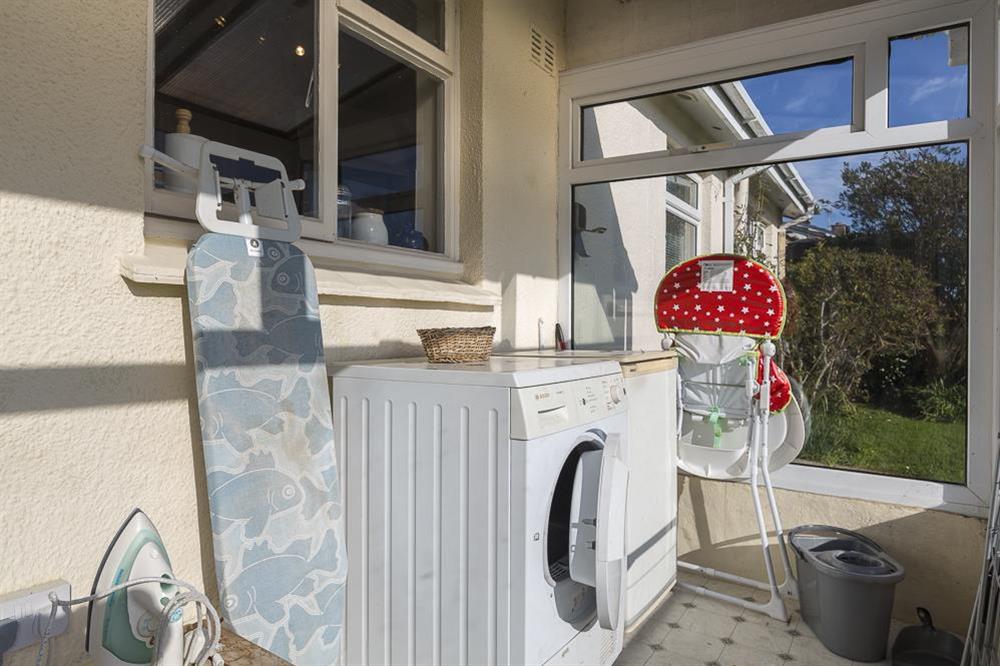 Conservatory with dryer and other amenities at Bankside in Hope Cove, Kingsbridge