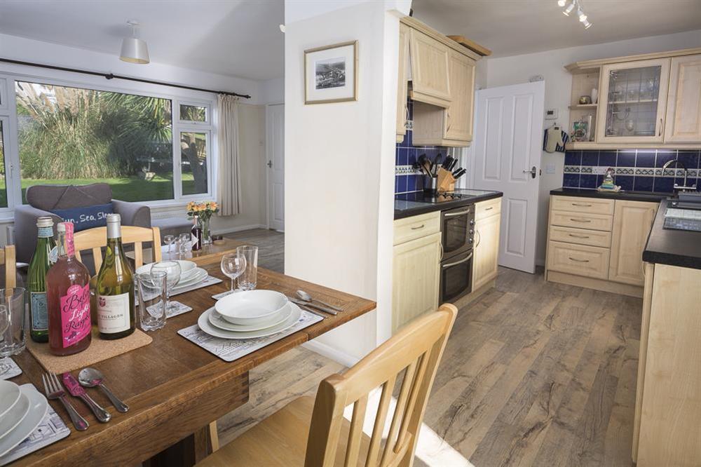 Dining area leads to the galley kitchen at Bankside in Hope Cove, Kingsbridge