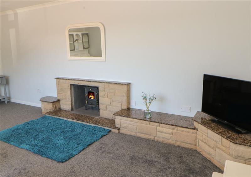 Relax in the living area at Bankwell Cottage, Causey near Sunniside