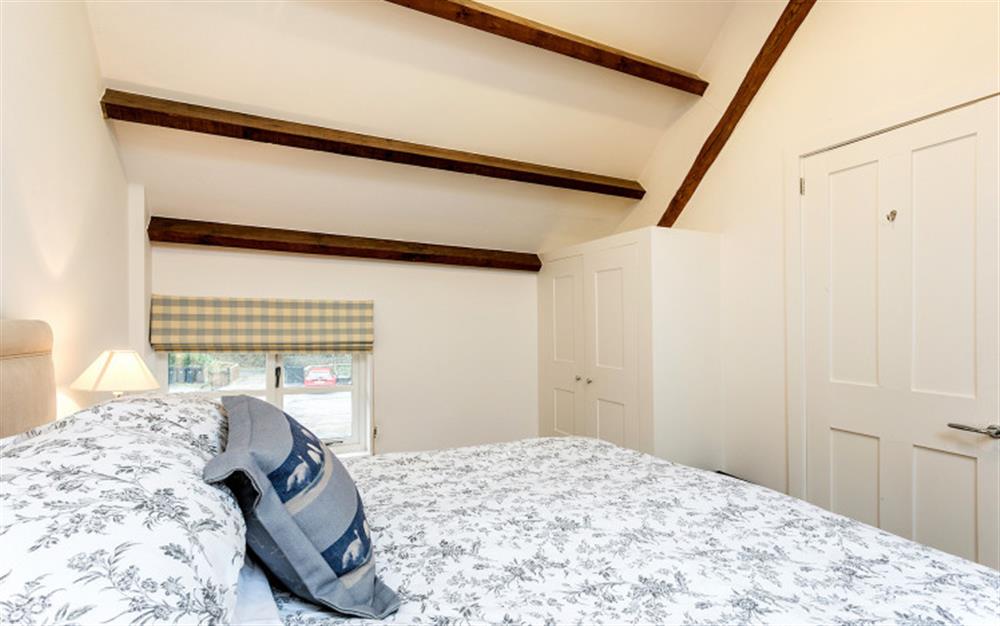 King size bed at Bantam Cottage in Ottery St Mary