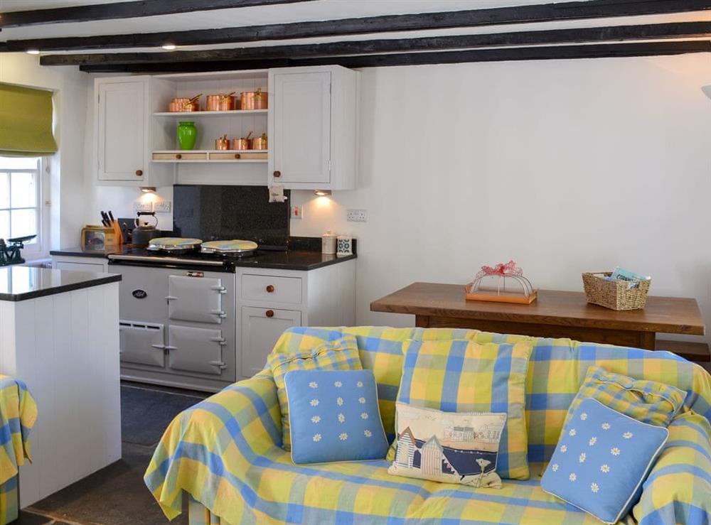 Cosy open plan living space at Bar Cottage in Port Isaac, Cornwall