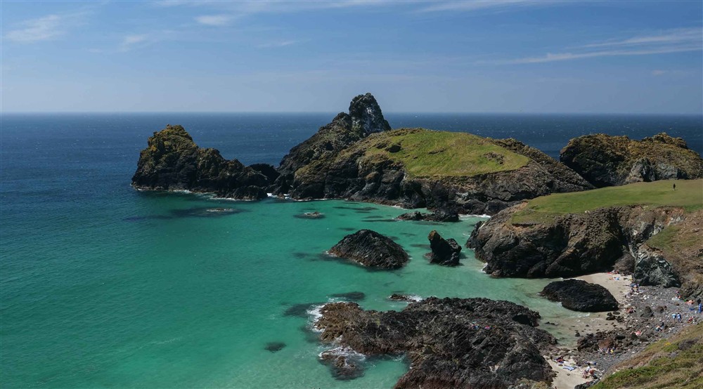 The view over rocks and a small beach at Bar Lodge in Helston, Cornwall