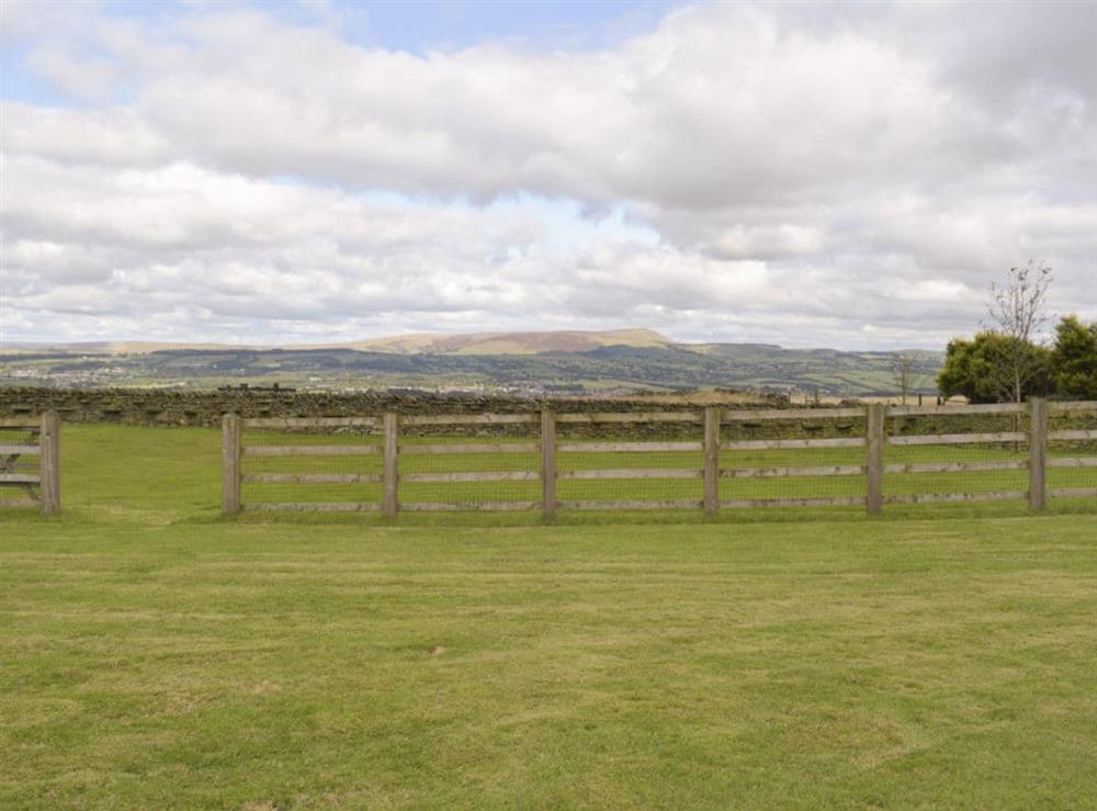Spectacular views over garden towards Pendle Hill at Barley Heights in Hapton, Lancashire