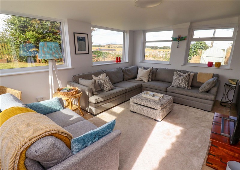 The living area at Barleycorn Cottage, Belford