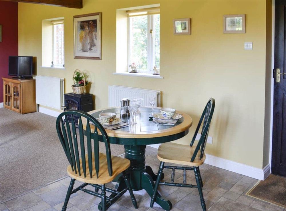 Compact farmhouse kitchen-style dining area at Barleycorn in Holnest, near Sherborne, Dorset