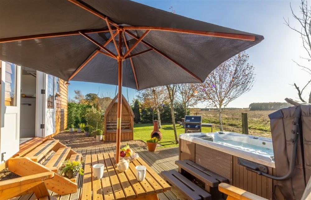 Hot tub, barbecue and seating to enjoy the open views at Barleywood, South Creake near Fakenham