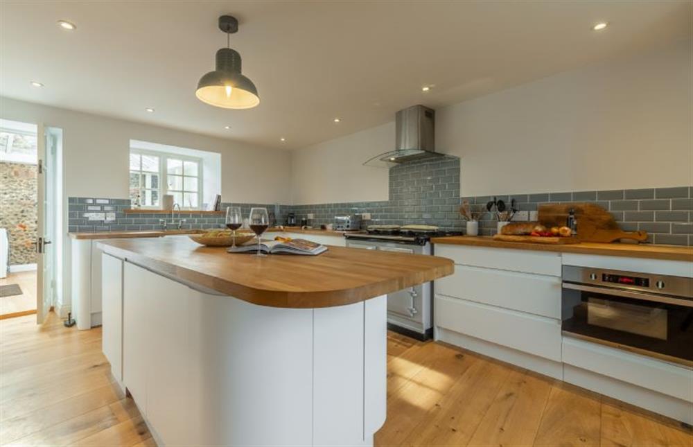 Ground floor: Kitchen with door to conservatory at Barn Cottage, Salthouse near Holt