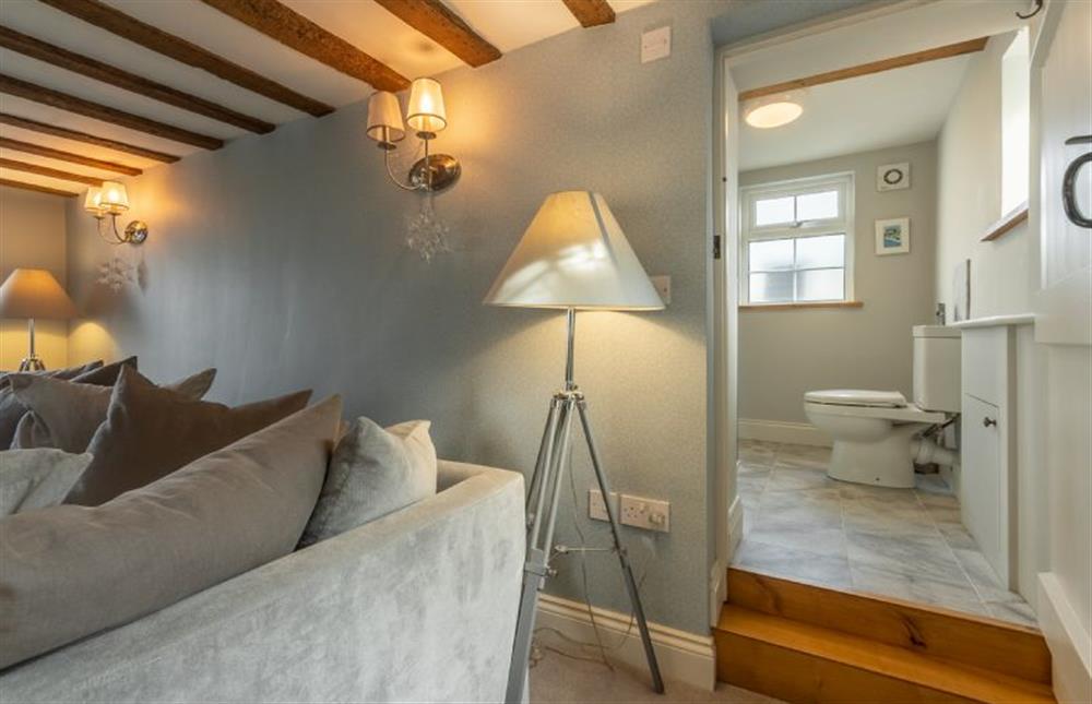 Ground floor: Sitting room with steps in to shower room at Barn Cottage, Salthouse near Holt