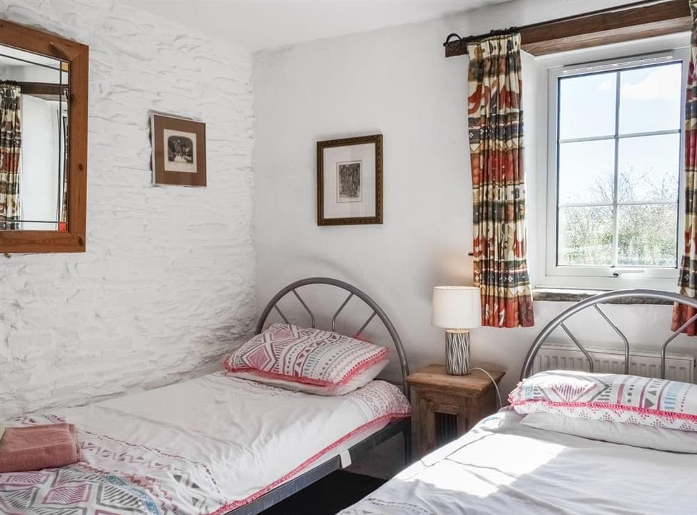 Twin bedroom at Barn Cottage in St Clether, near Launceston, Cornwall