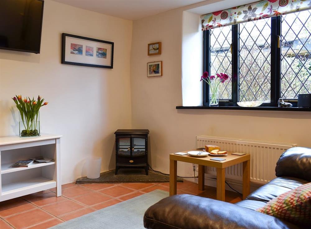 Living room at Barn Court Cottage in Washfield, near Tiverton, Devon