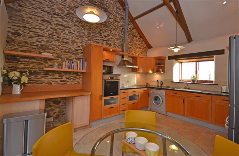 Gorgeous kitchen with high ceilings at Barn Dipperty in Loddiswell