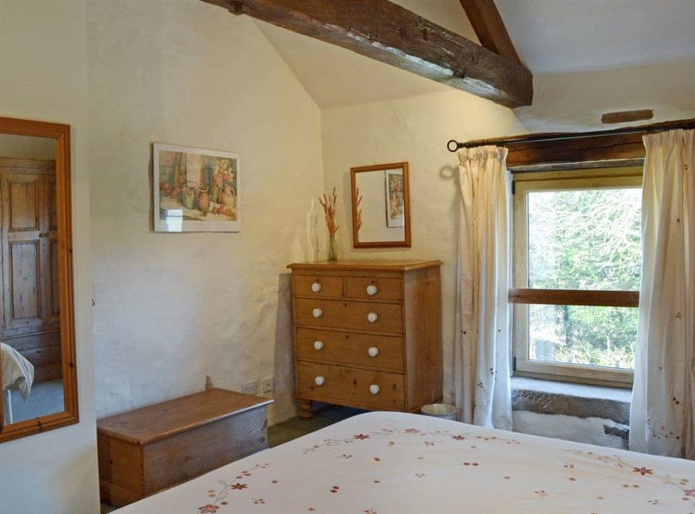 Spacious double bedroom with beams (photo 2) at Barn End Cottage in Blackwell in the Peak, near Buxton, Derbyshire