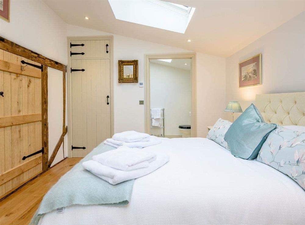 Romantic double bedroom with beams (photo 3) at Barn End Cottage in Carlton, near Saxmundham, Suffolk