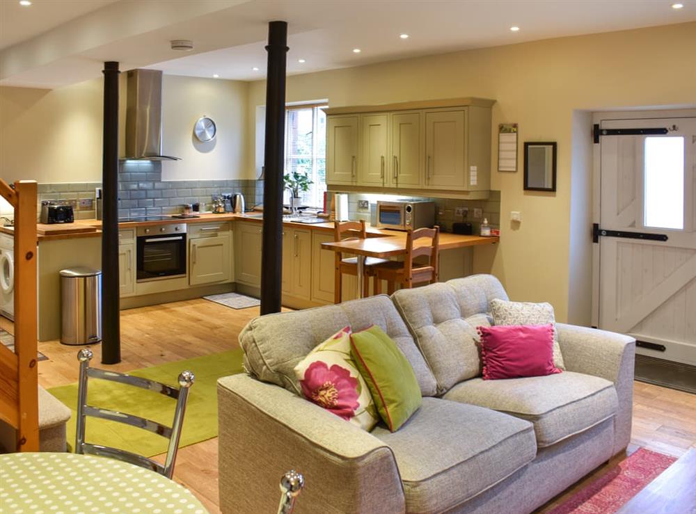 Open plan living space (photo 3) at Barn End in Pooley Bridge, near Ullswater, Cumbria