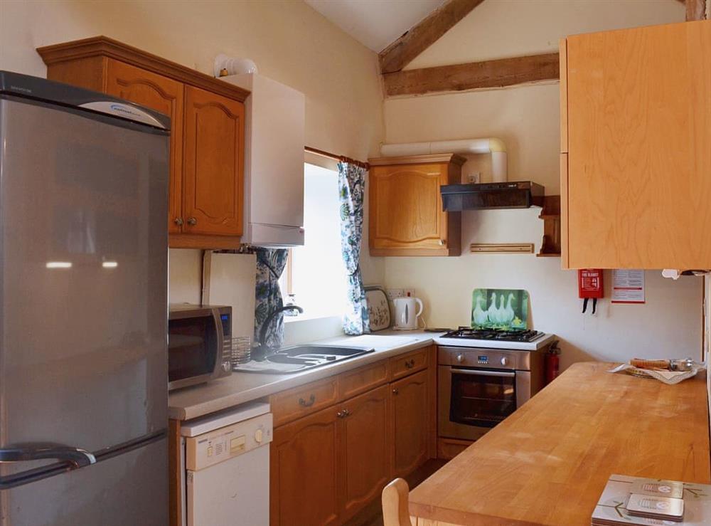 Traditional kitchen with modern appliances at Barn Owl Cottage in Matlock, Derbyshire