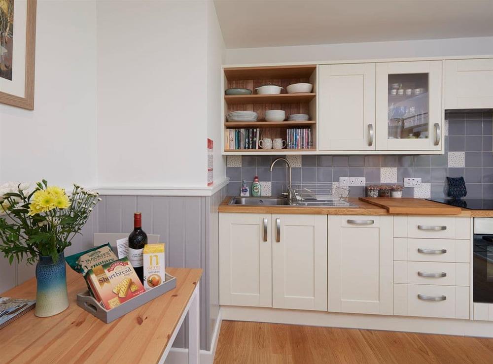 Well-equipped fitted kitchen at Barn Owl Cottage in Newton, near Tain, Highlands, Ross-Shire