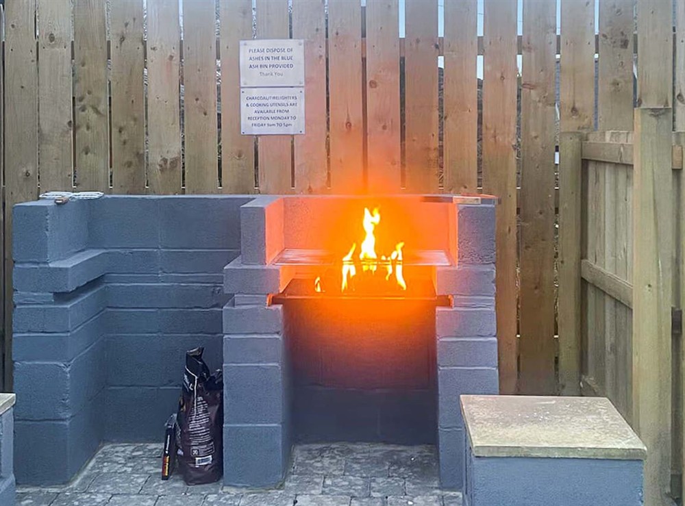 Outdoor eating area at Barn Owl Cottage in Rowley, near Consett, Durham