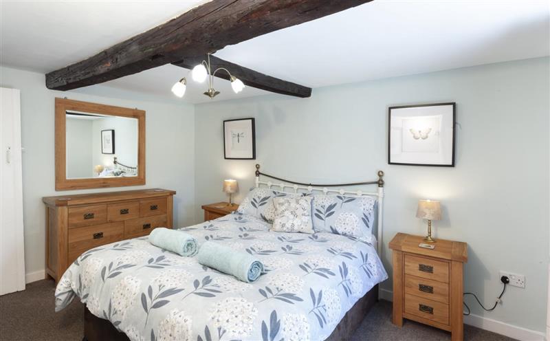 A bedroom in Barn Owl Cottage at Barn Owl Cottage, Wheddon Cross