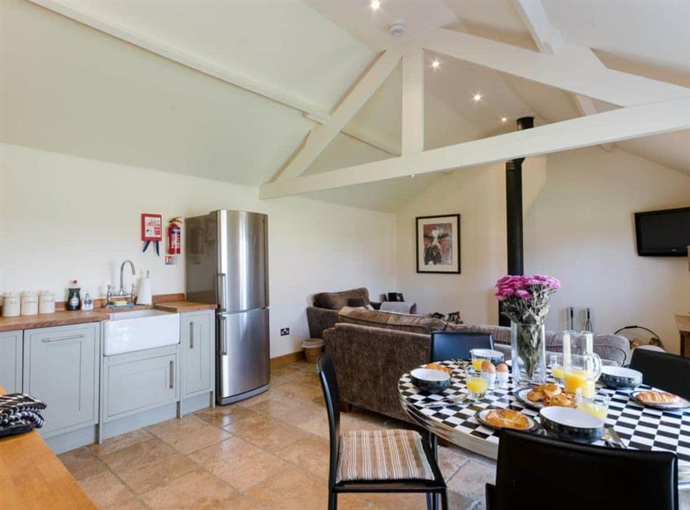 Open plan living space dining area at Barn Owl Lodge in near Carsington, Derbyshire