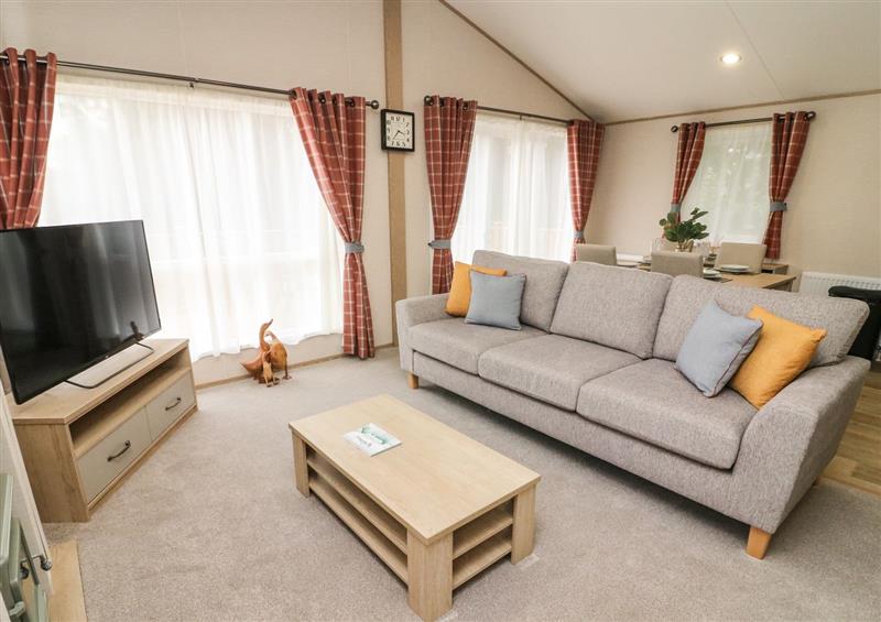 Relax in the living area at Barneys Retreat, Carnforth