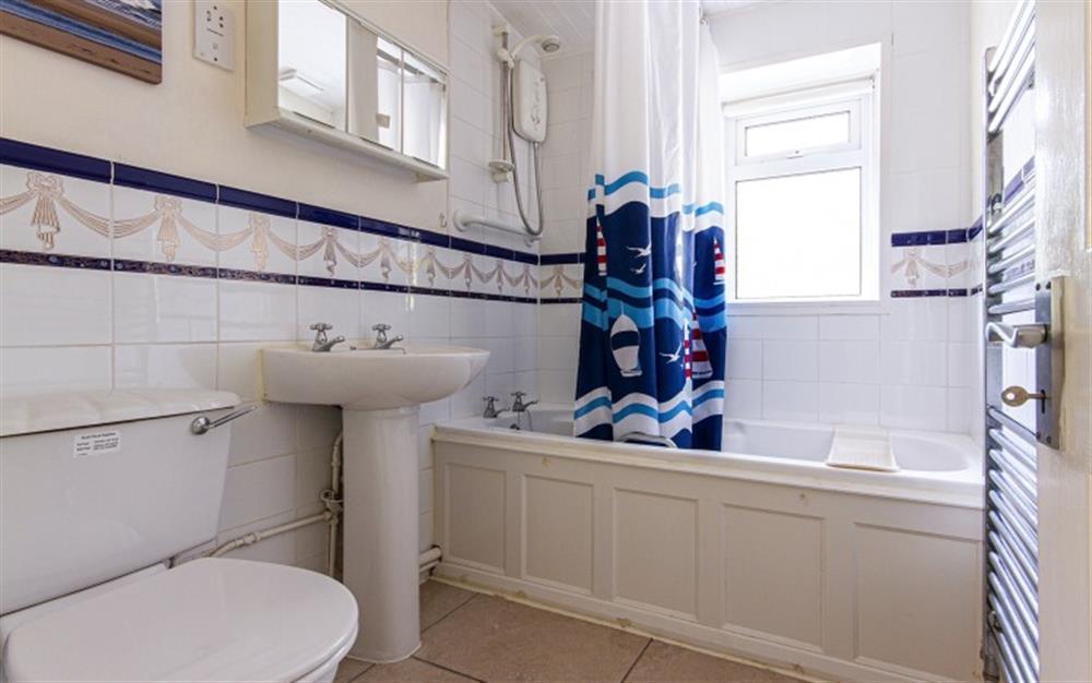Family bathroom WC with shower over bath at Barnhill in Crantock