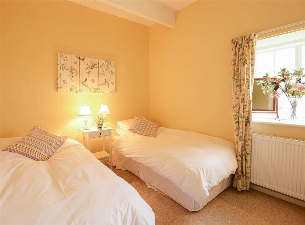 Super kingsize double bedroom configured as a twin at Barningham Hall Stable in Matlaske, near Sheringham, Norfolk