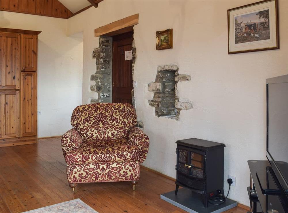Open plan living space at Barns End Cottage in Ludchurch, near Amroth, Pembrokeshire, Dyfed