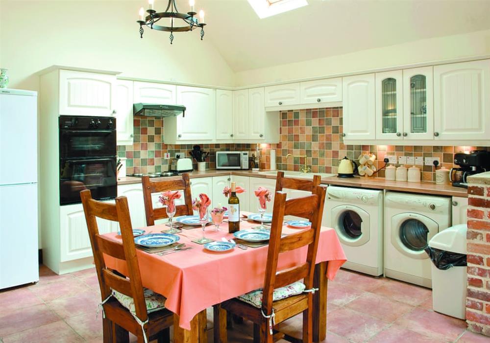 Open plan living/dining room/kitchen (photo 2) at Barnstable Cottage in Lowestoft, Suffolk