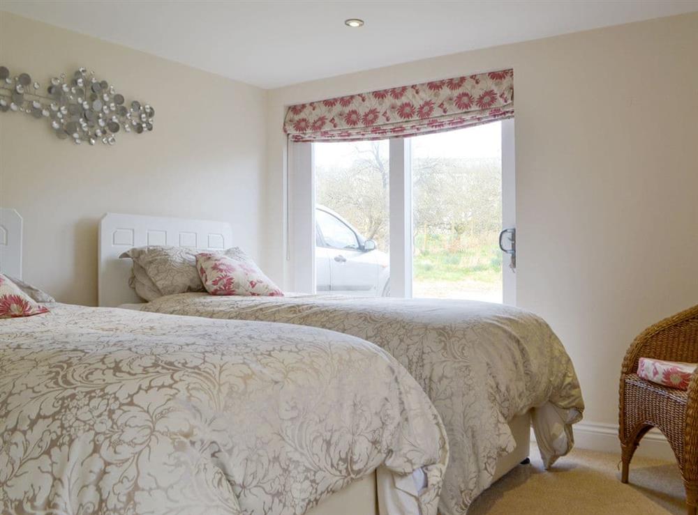 Good-sized twin bedroom at Barrow Tenement in Lyth Valley, near Kendal, Cumbria