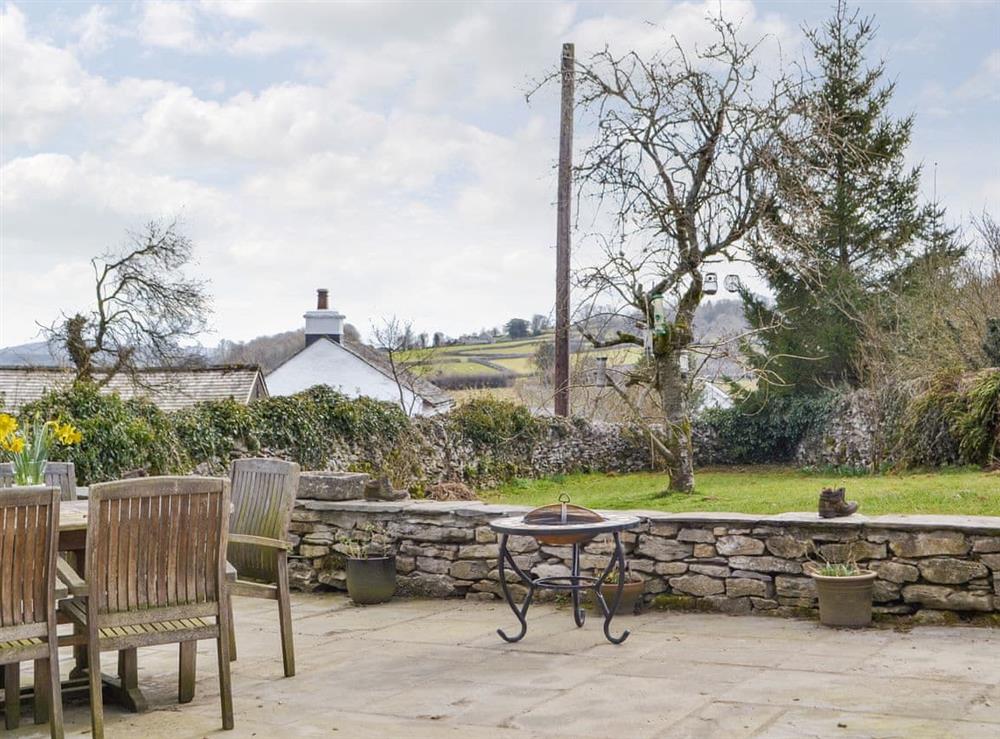 Paved patio area with quality outdoor furniture at Barrow Tenement in Lyth Valley, near Kendal, Cumbria