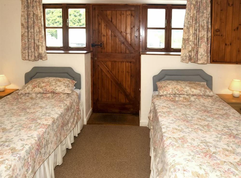 Twin bedroom at Barrowmead Cottage in Winscombe, Avon
