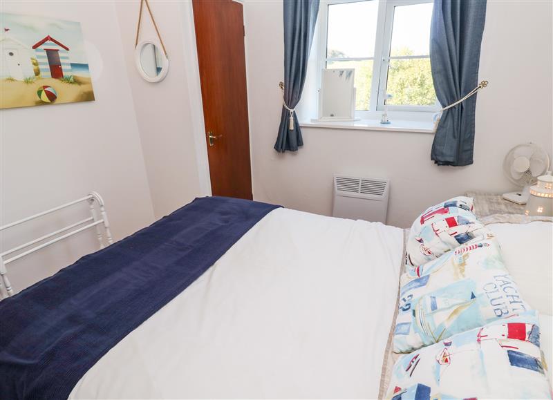 One of the bedrooms at Barton Woods Cottage, Kenegie Manor Holiday Park near Penzance