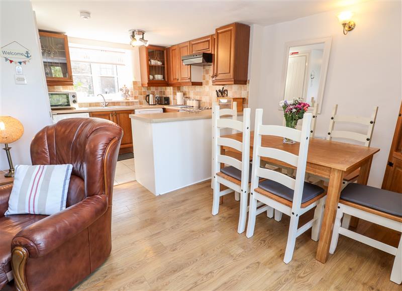 Relax in the living area at Barton Woods Cottage, Kenegie Manor Holiday Park near Penzance