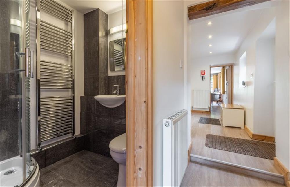 Ground floor: Cloakroom/shower room and hallway at Basil Cottage, Wells-next-the-Sea