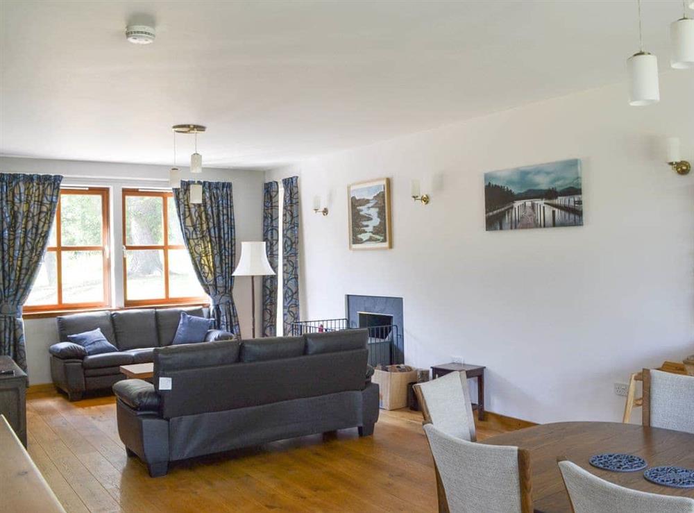 Open plan living space at Battanropie Lodge in Carrbridge, Inverness-Shire