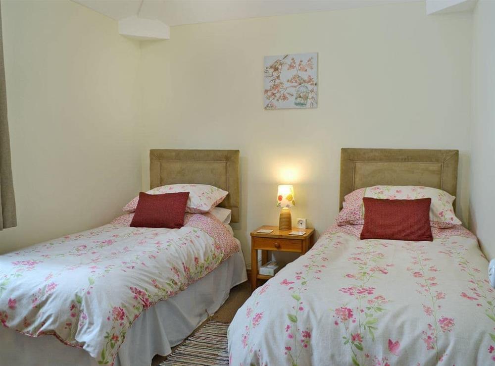 Cosy twin bedroom at Bay Cottage in Keswick, Cumbria
