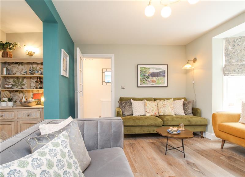 Relax in the living area at Bay Cottage, Weymouth