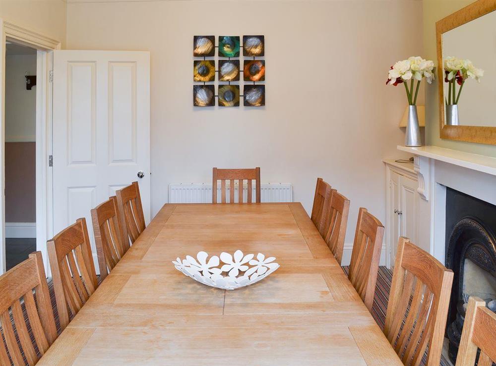 Dining room with large table seating up to 10 people at Bay House in Filey, North Yorkshire