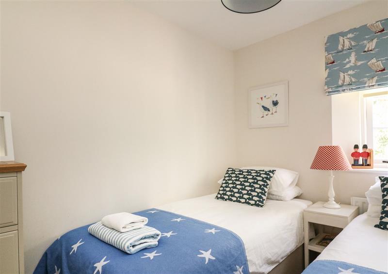A bedroom in Bay Tree Cottage at Bay Tree Cottage, Thurlestone
